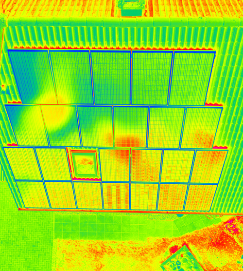 aerial view of a colorful tiled roof with patterns and sections showing vibrant colors and grid lines suitable for design inspiration and two dimensional layouts